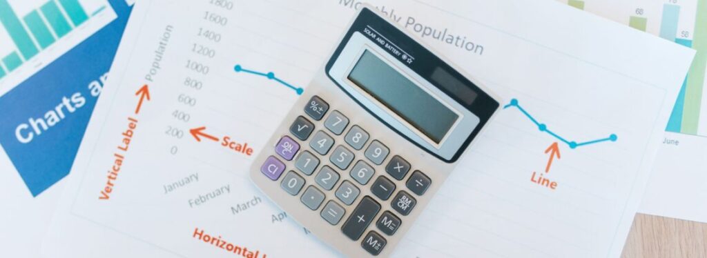 Calculadora e graficos representando a taxa de performance no copy trade
